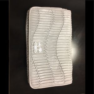 Never used Coach Clutch bag